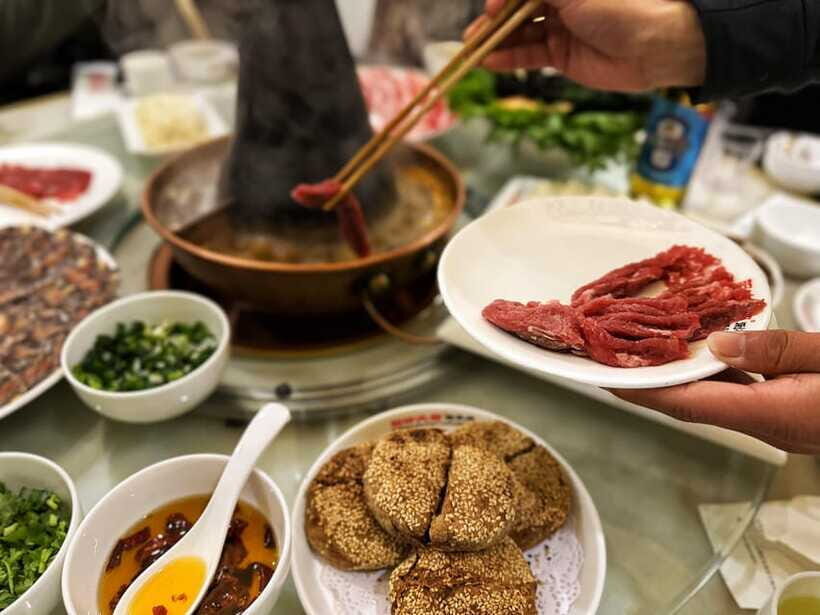 Beijing Hutong Food Crawl Delights: Peking duck, Hotpot&More - Mongolian hot pot in a charcoal copper pot: build-your-own warmth